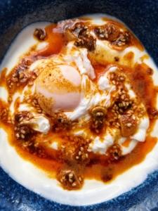 Poached eggs, yoghurt and madhuka brown butter sizzle